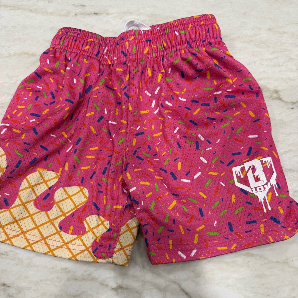 Baseball Lifestyle colorful ice cream drip sprinkle boys shorts.